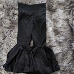 Black Flared Leggings with Dramatic Ruffles